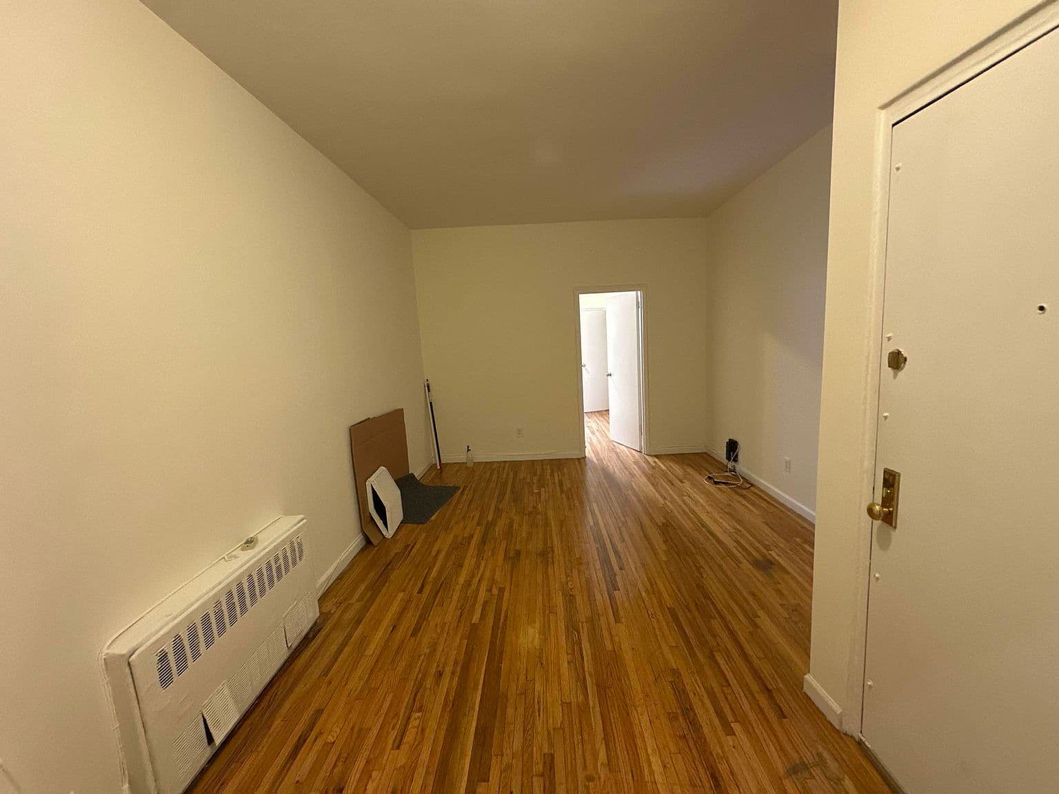 Upper East Side One-Bedroom Apartment with Windowed Kitchen and Hardwood Floors