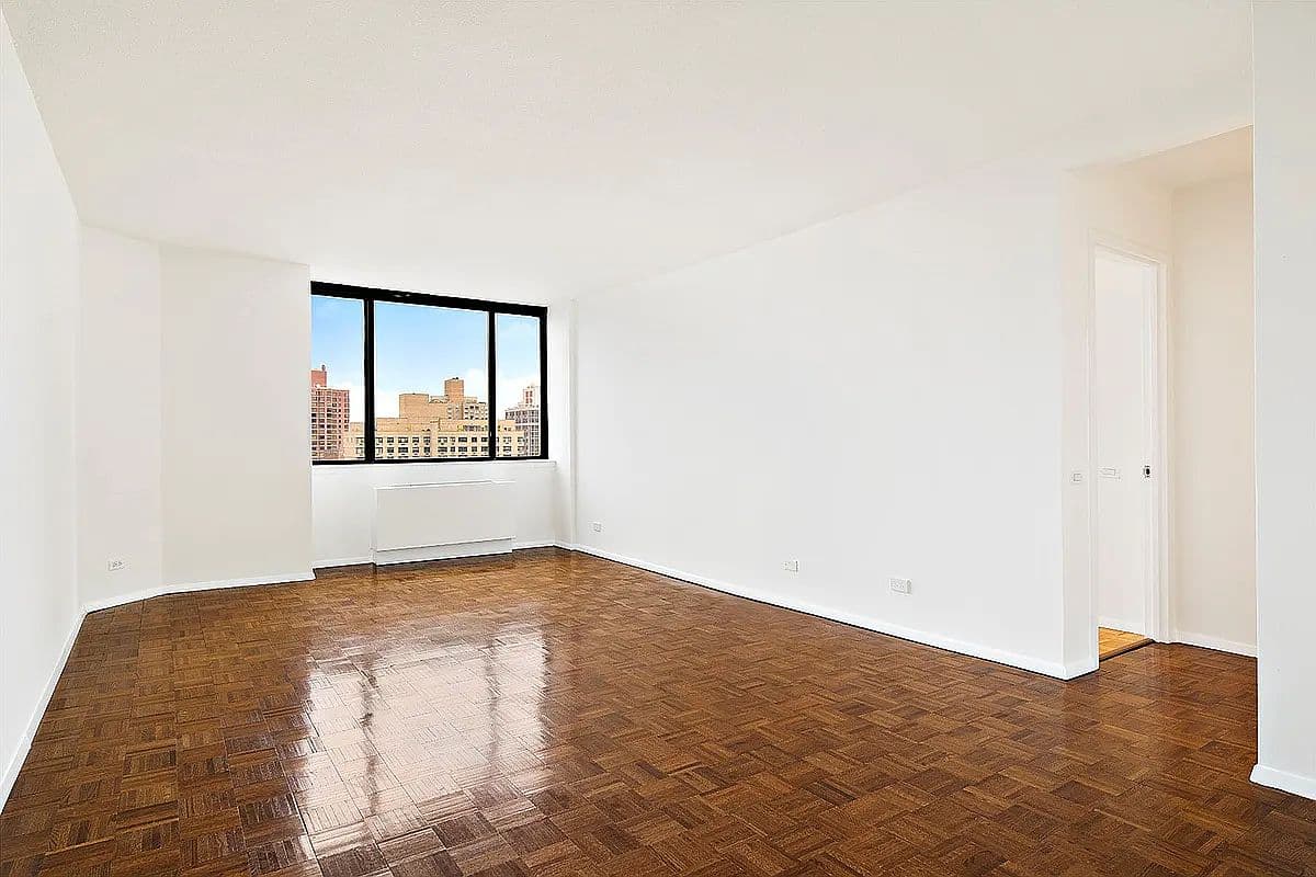 Renovated High-Floor One-Bedroom Apartment with River Views in Manhattan